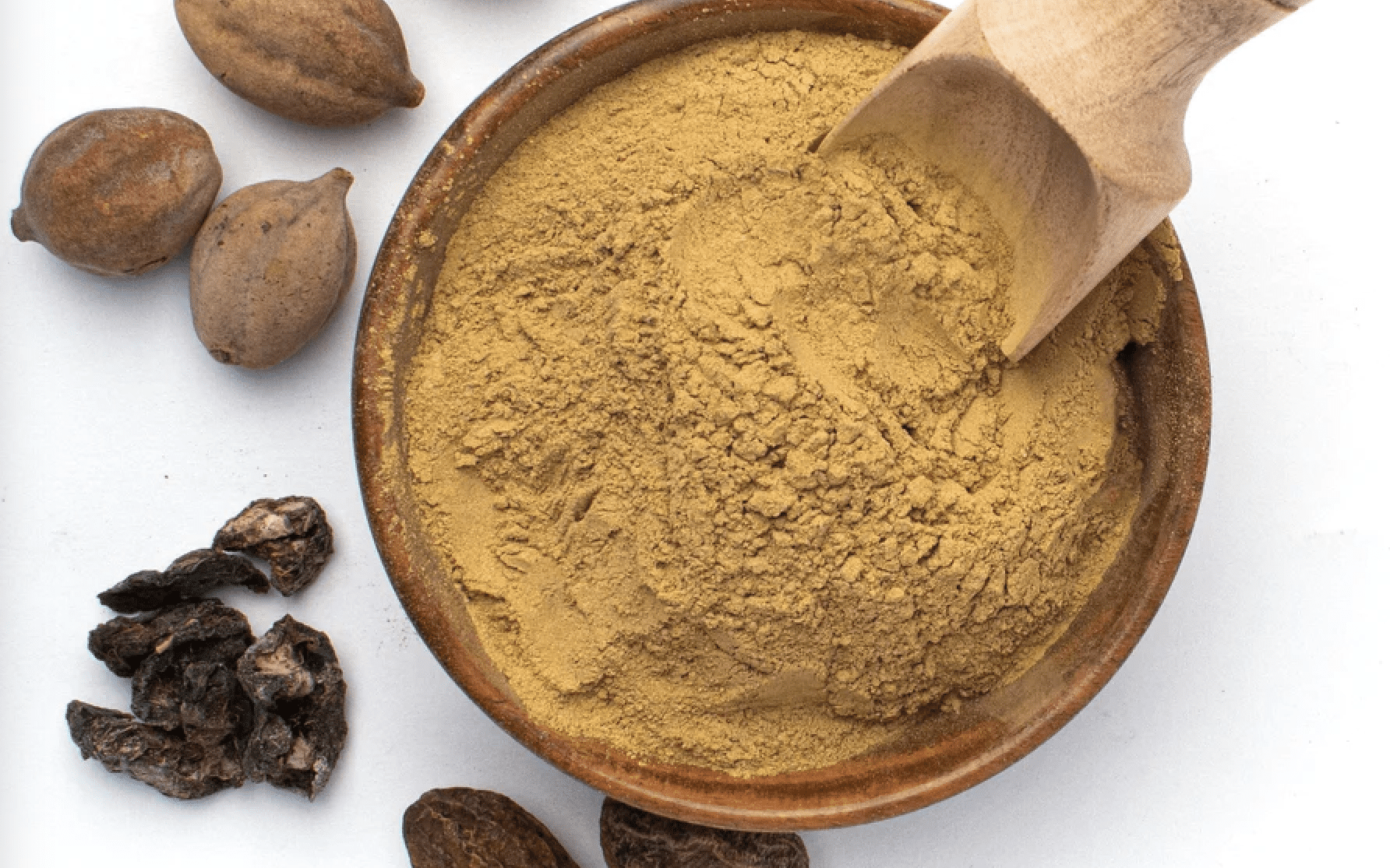 Organic Triphala Powder in a bowl